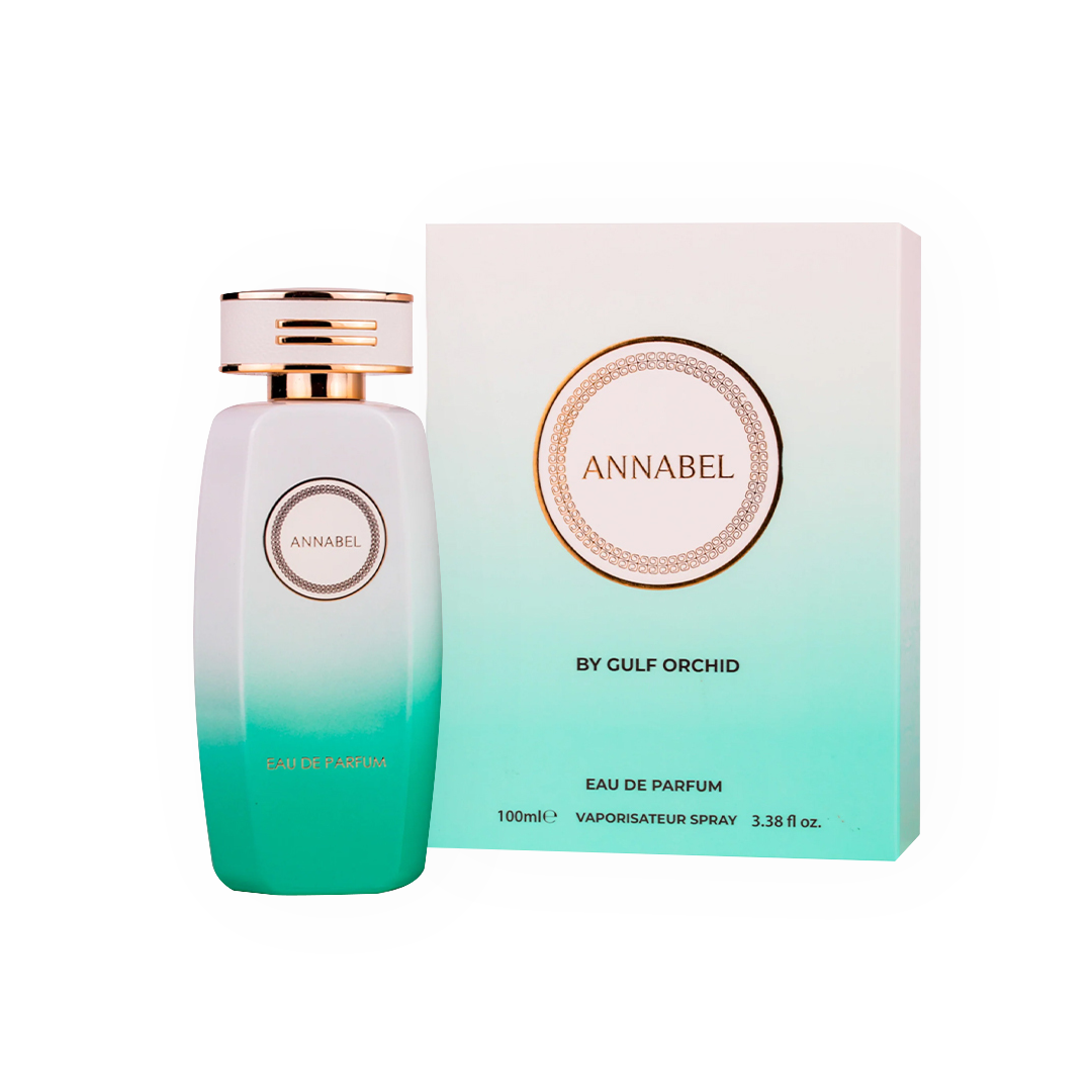 Parfum Annabel 100ml - Gulf Orchid. Flacon élégant blanc dégradé turquoise avec un bouchon doré raffiné, accompagné d'une boîte assortie au design épuré et moderne. Eau de parfum féminine, fraîche et légère, idéale pour une fragrance délicate aux notes florales et aquatiques. Parfait pour un style chic et quotidien.
