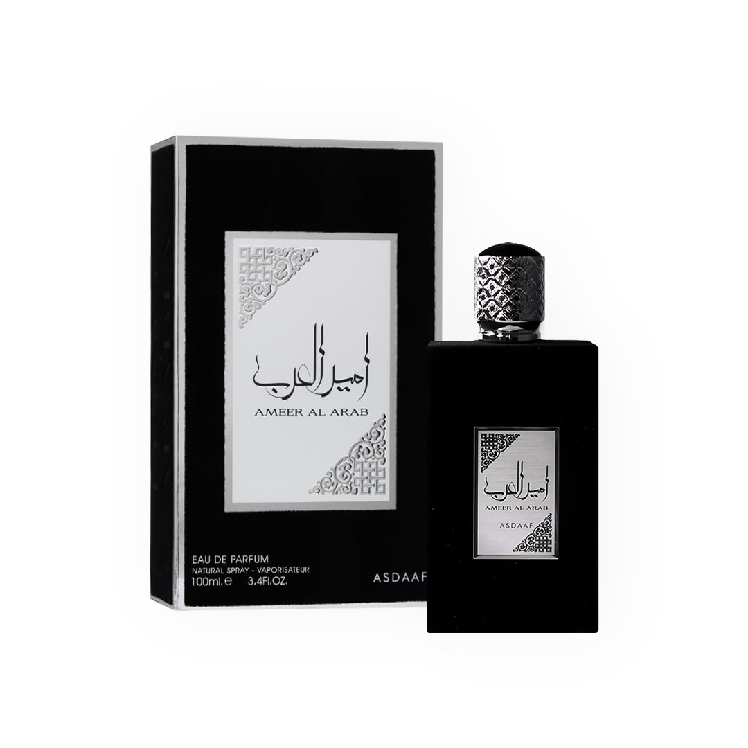 Eau de Parfum Ameer Al Arab Noir 100ml de Asdaaf, présentée dans un flacon noir mat sophistiqué avec un bouchon argenté gravé, accompagnée de son élégante boîte noire et blanche aux motifs orientaux.