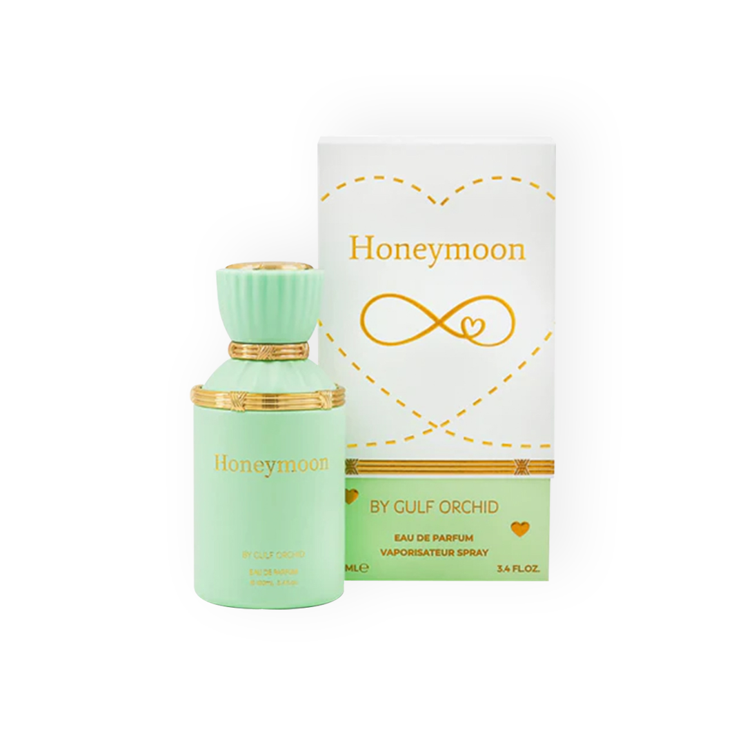 Flacon et boîte de l'Eau de Parfum HoneyMoon 100ml de Gulf Orchid, une fragrance mixte fruitée, florale et gourmande aux notes de miel, jasmin et agrumes.