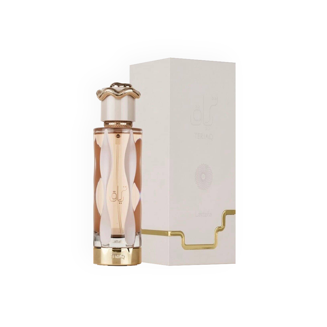 Eau de Parfum Dubaï Teriaq 100ml de Lattafa, présentée dans un flacon luxueux au design ondulé doré et blanc, accompagnée d'une boîte blanche élégante avec des accents dorés raffinés.